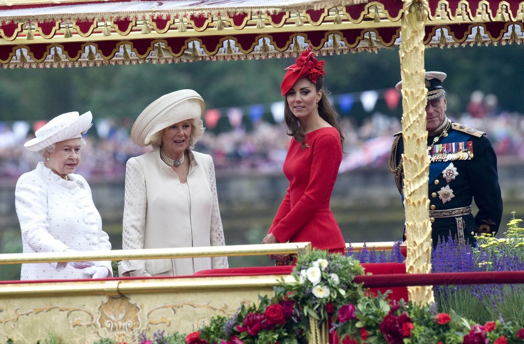 LONDON, ENGLAND - JUNE 03: (L-R) Queen Elizabeth II, Camilla, Duchess of Cornwall, Catherine, Duchess of Cambridge and Prince Philip, Duke of Edinburgh look out from the Spirit of Chartwell during the Diamond Jubilee Thames River Pageant on June 3, 2012 in London, England. For only the second time in its history the UK celebrates the Diamond Jubilee of a monarch. Her Majesty Queen Elizabeth II celebrates the 60th anniversary of her ascension to the throne. Thousands of well-wishers from around the world have flocked to London to witness the spectacle of the weekend's celebrations. The Queen along with all members of the royal family will participate in a River Pageant with a flotilla of a 1,000 boats accompanying them down The Thames, the star studded free concert at Buckingham Palace, and a carriage procession and a service of thanksgiving at St Paul's Cathedral.  (Photo by WPA - David Crump/Getty Images)