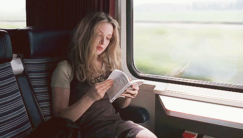 reading-on-the-train-gif