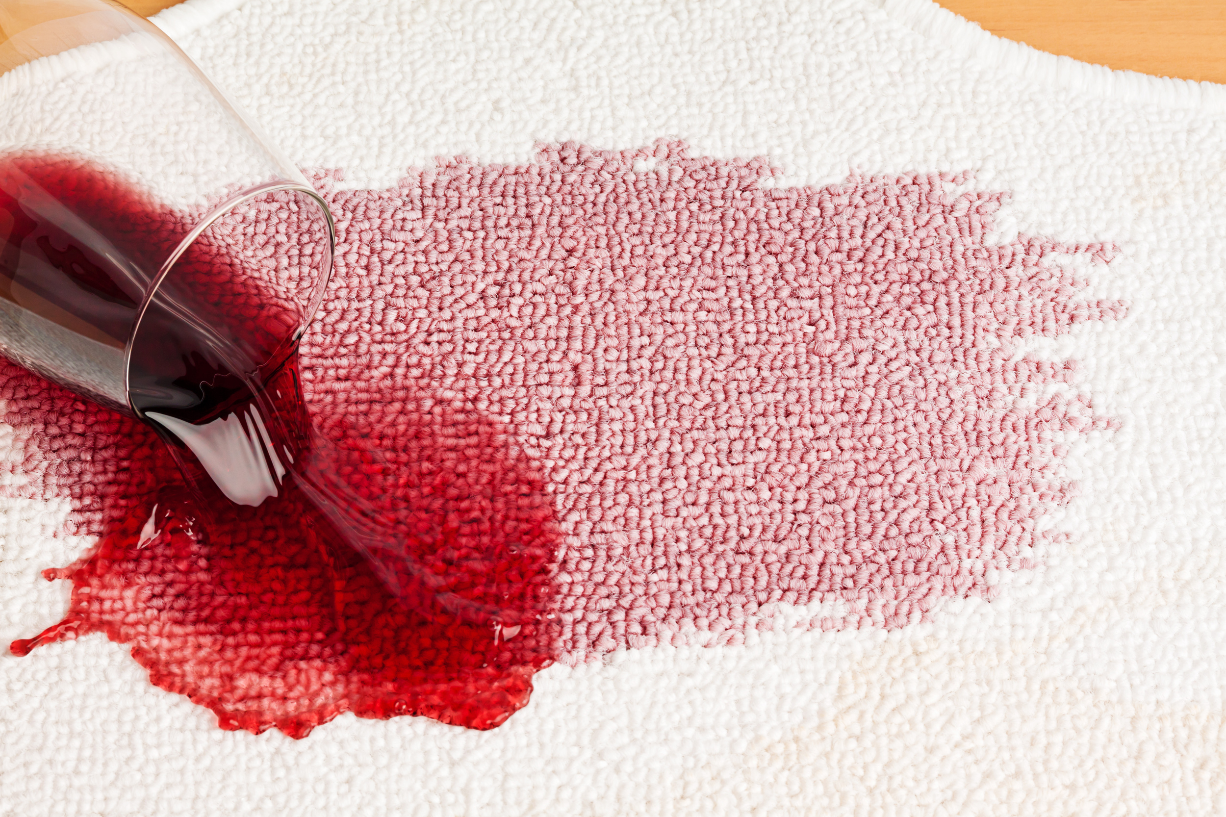 red-wine-is-spilled-on-a-carpet-reverse-glass-and-all-relate-1