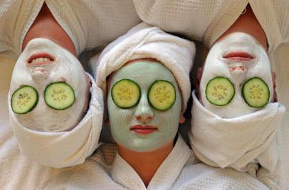 Women undergo facial beauty treatments a