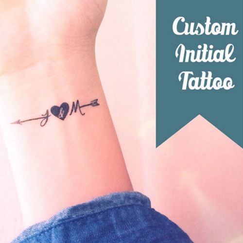 Tatuajes de iniciales para que lleves marcado para siempre el amor 5