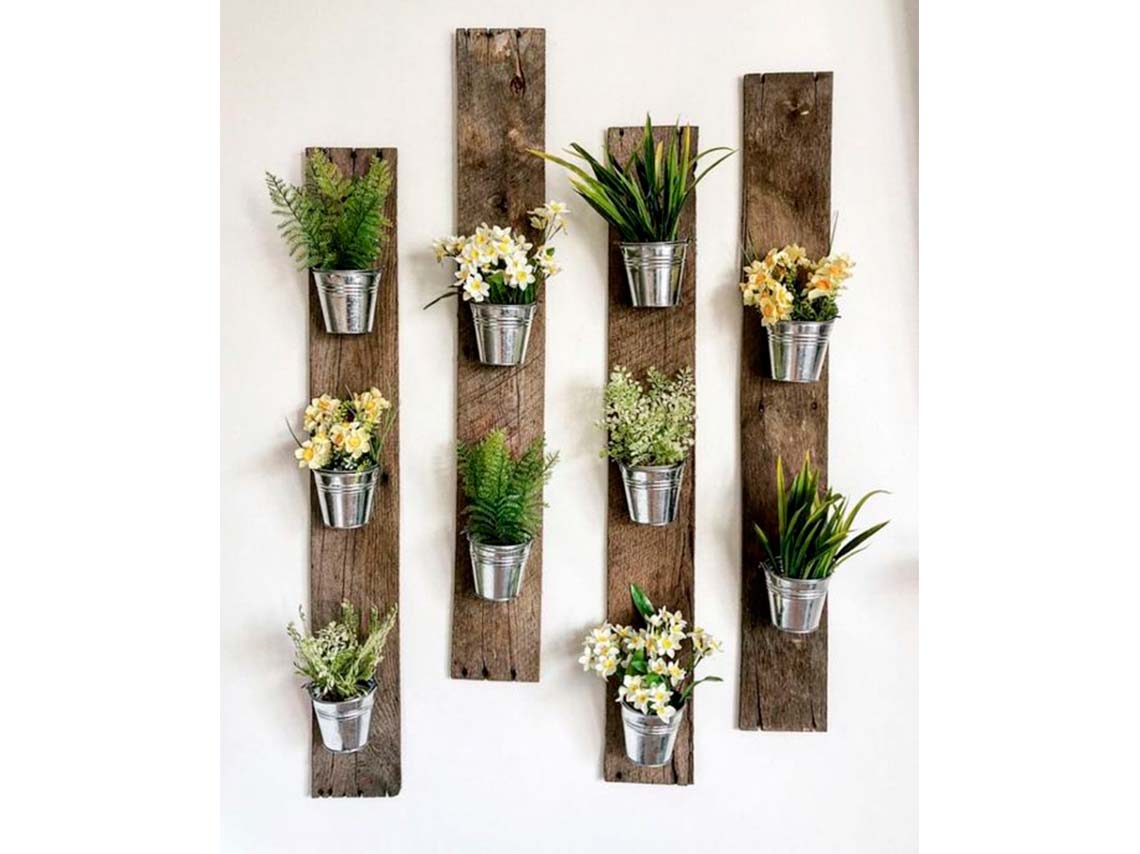 10 ideas para decorar tus paredes con macetas o plantitas 8