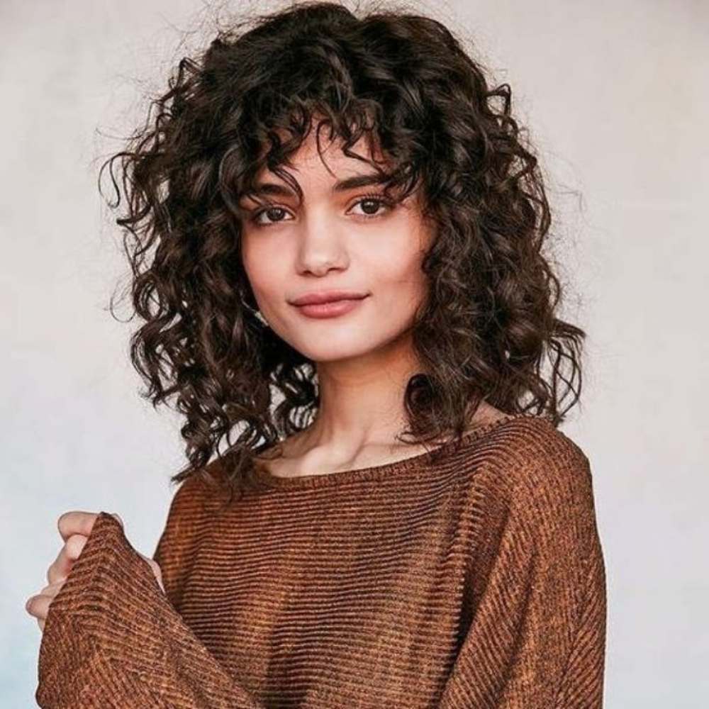 10 ideas de flecos para mujeres de cabello chino 6