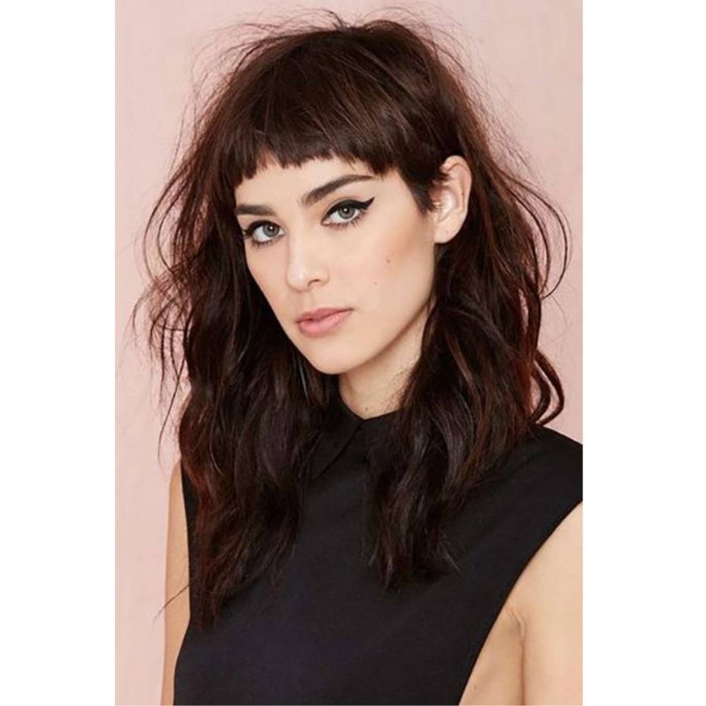 10 formas de llevar fleco con cabello largo con estilo