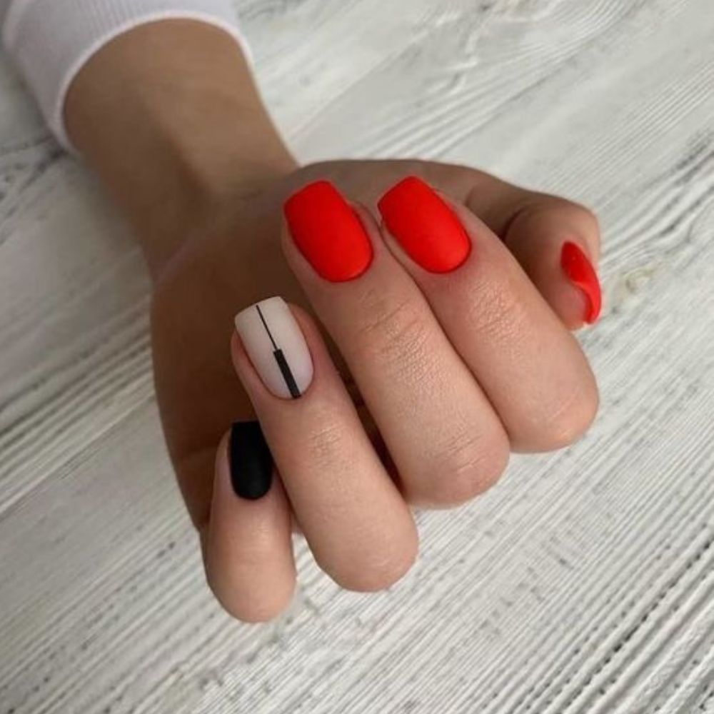 10 ideas para combinar tus uñas rojas con otros colores- rojo naranja-negro