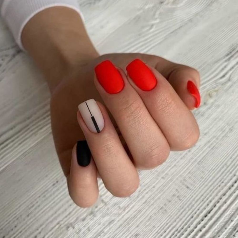 10 ideas para combinar tus uñas rojas con otros colores- rojo naranja-negro