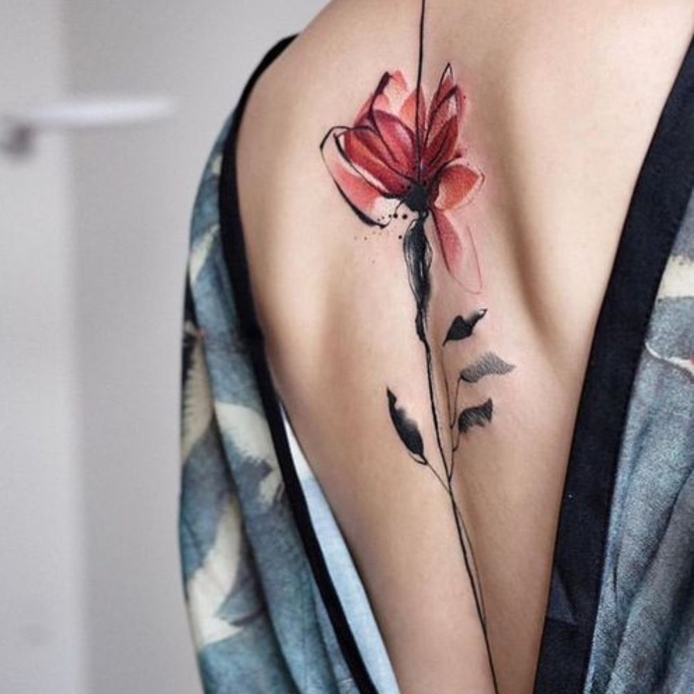 10 tatuajes que te pueden servir para cubrir una cicatriz- tatuaje en la espalda