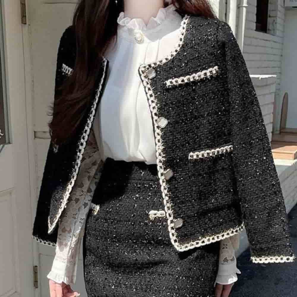 10 formas de llevar tweed a la oficina y lucir elegantemente- clásico negro 