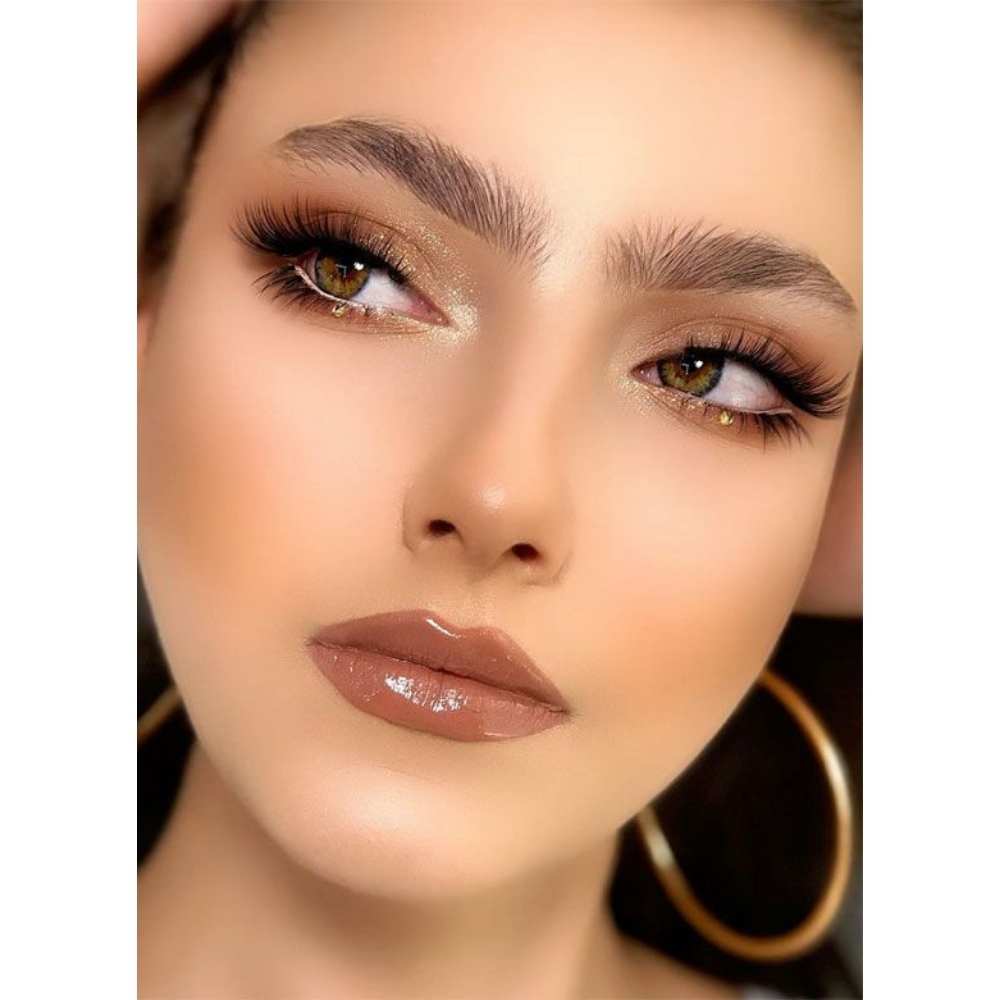 Makeup dramático en tonos bronce Foxy eyes con sombras marrón