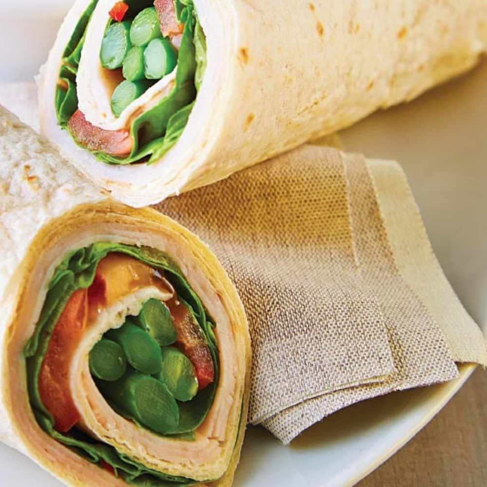 Wrap de espinaca con jamón y verduras