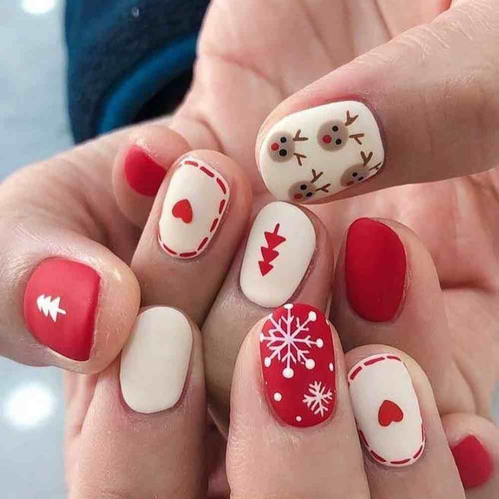Diseño de uñas rojas con nude para navidad