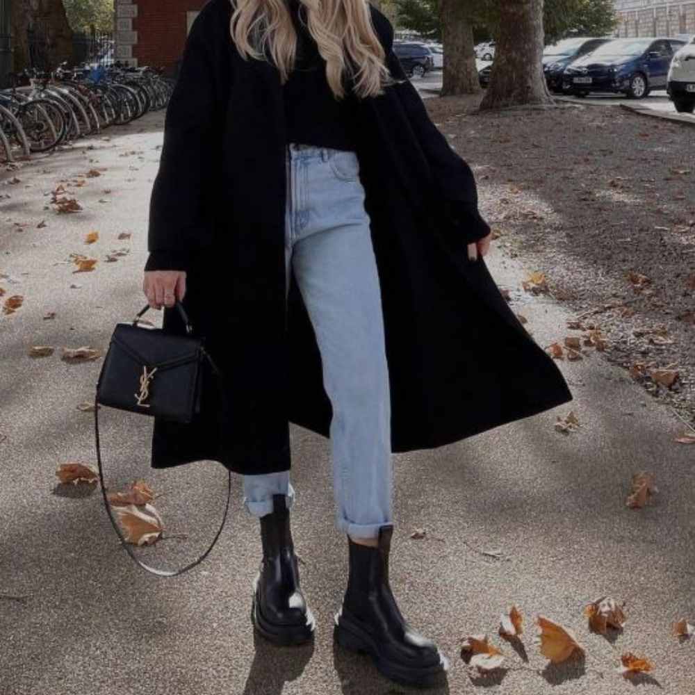7 outfits para usar botas negras con jeans este invierno 3
