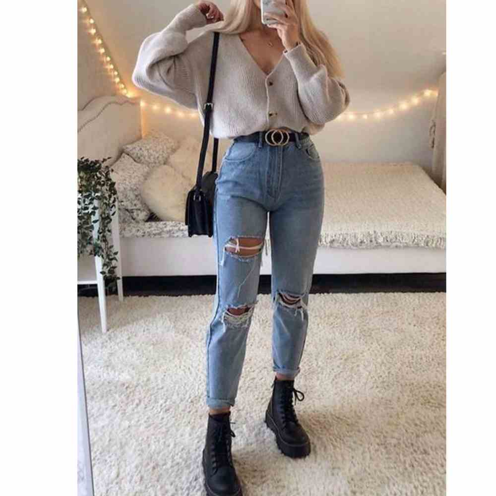 7 outfits para usar botas negras con jeans este invierno | Mujer de 10