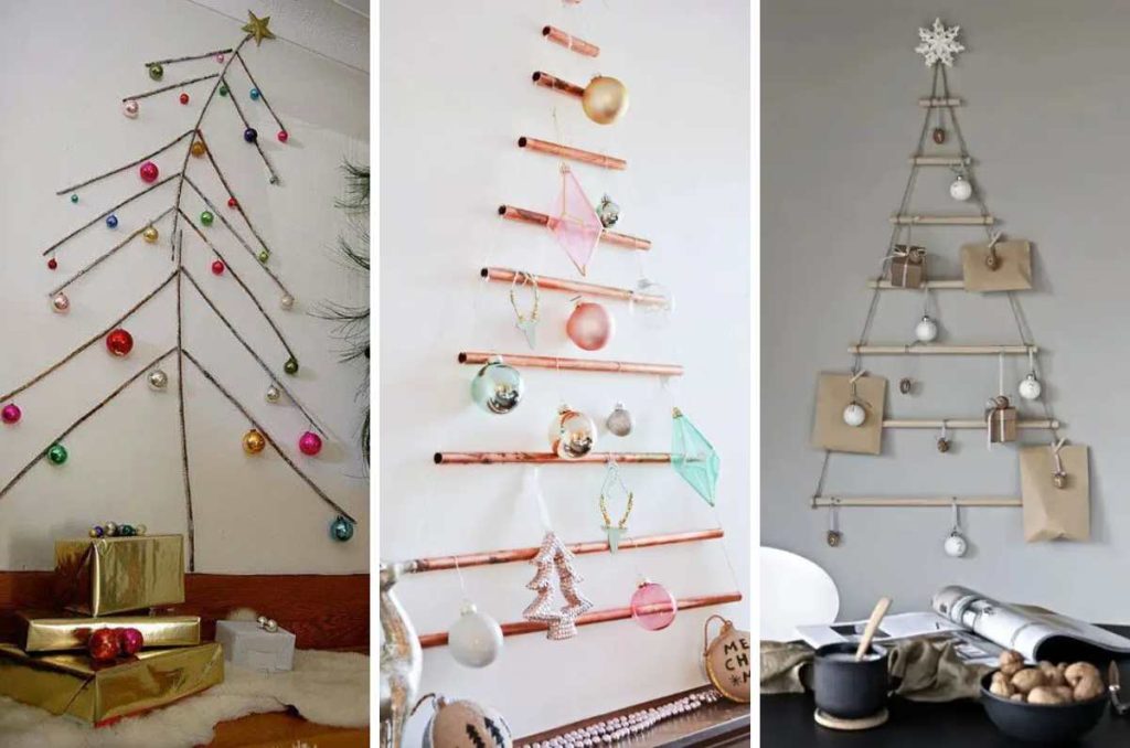 arbol de navidad en la pared con palitos