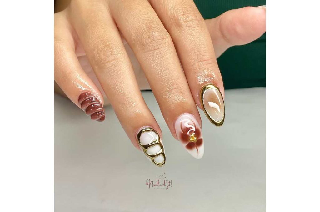 Nail art en tonos marrón y beige