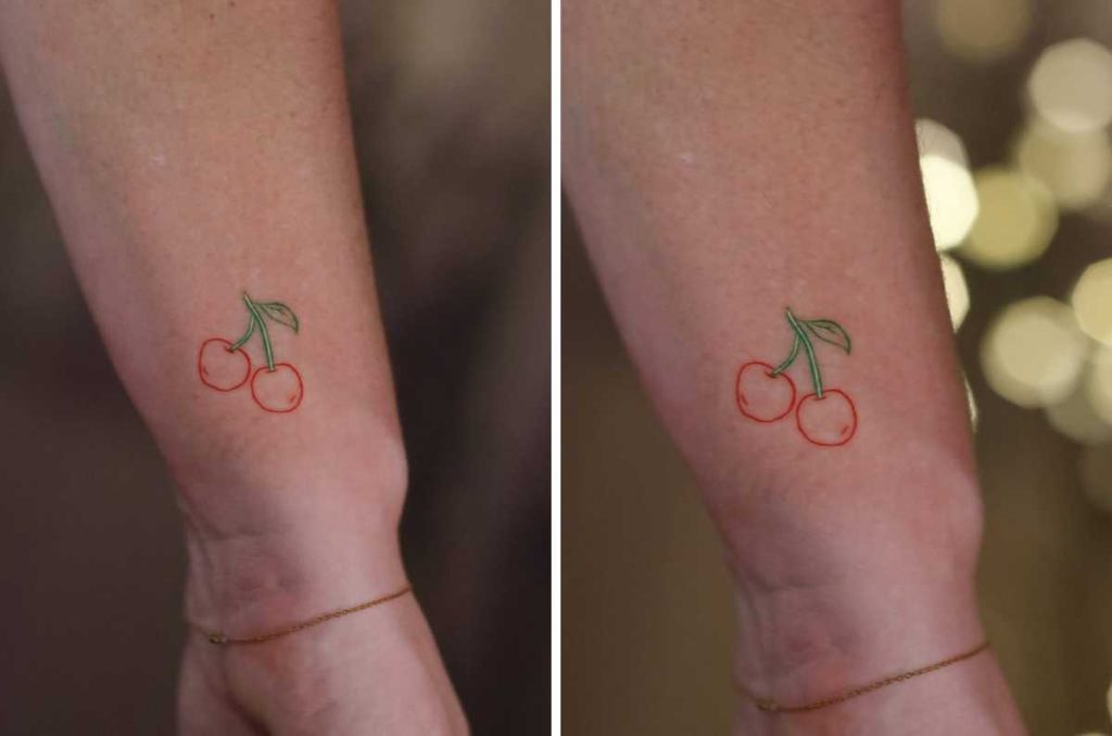 tatuaje cereza en la muñeca