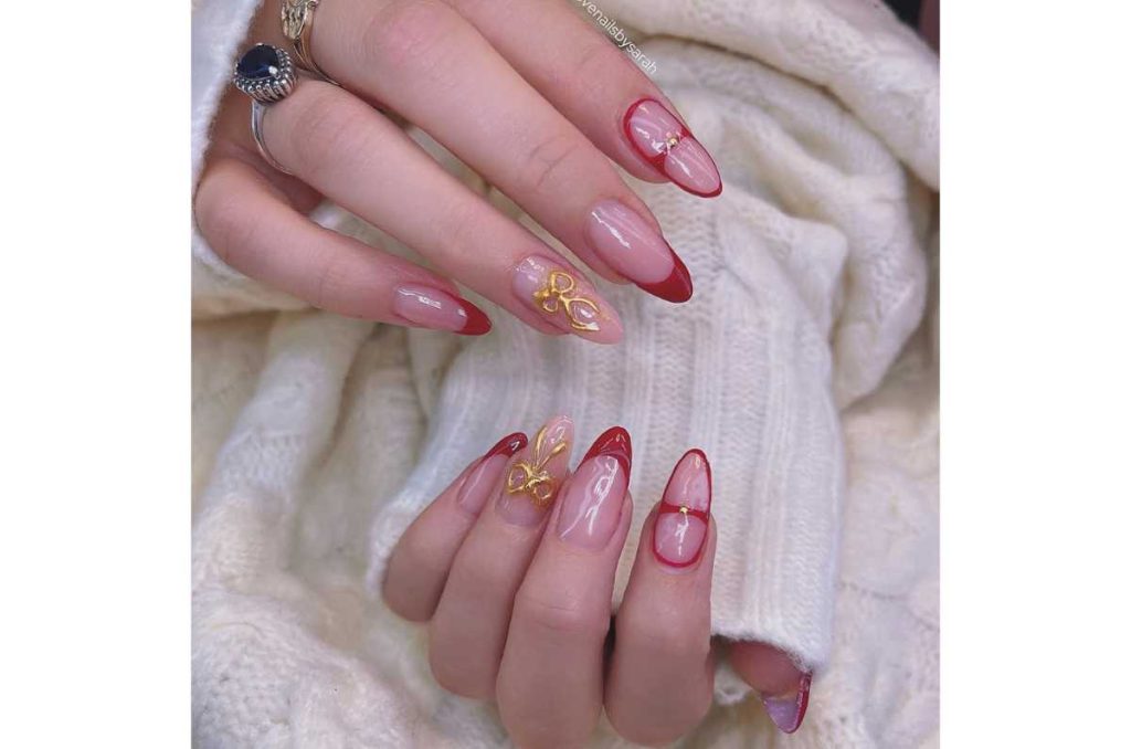 Uñas rojo con dorado