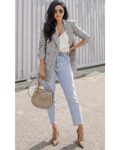 Outfits elegantes con mom jeans para conquistar la oficina con estilo 1