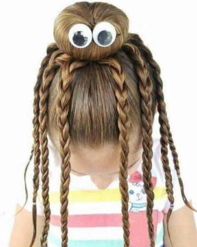 Mini chongo con ojos y mini trenzas cayendo