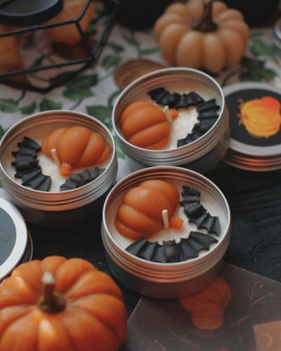 Velas de calabaza con murciélagos para halloween
