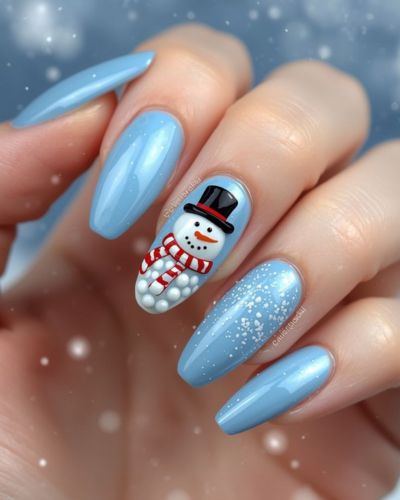 Nails glazed en color azul con muñeco de nieve en color blanco