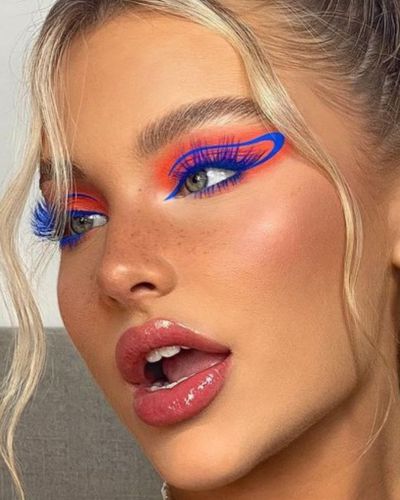 Maquillaje gráfico y sombras vibrantes para el concierto de Bad Bunny