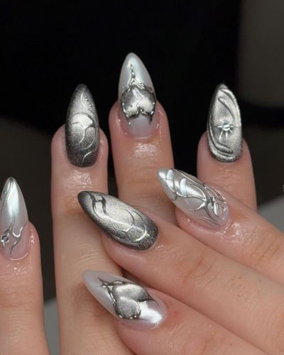 Diseños de uñas plateadas para Navidad 2025