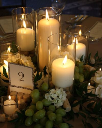 Foto de centro de mesa para boda con velas
