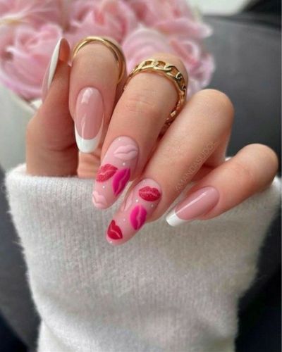 Uñas de San Valentín con francesas en color blanco y besos en relieve