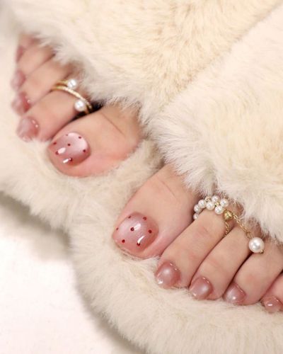 Pedicure cat eye con polka dots