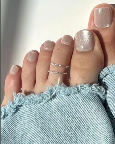 Pedicure cat eye dorado
