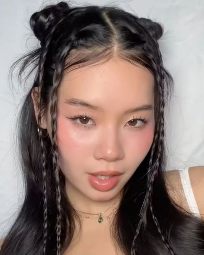 Peinados con cabello suelto para ver el Mundial: space buns
