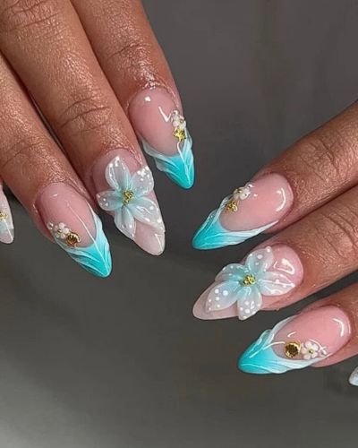 Uñas turquesa con flores hawaianas